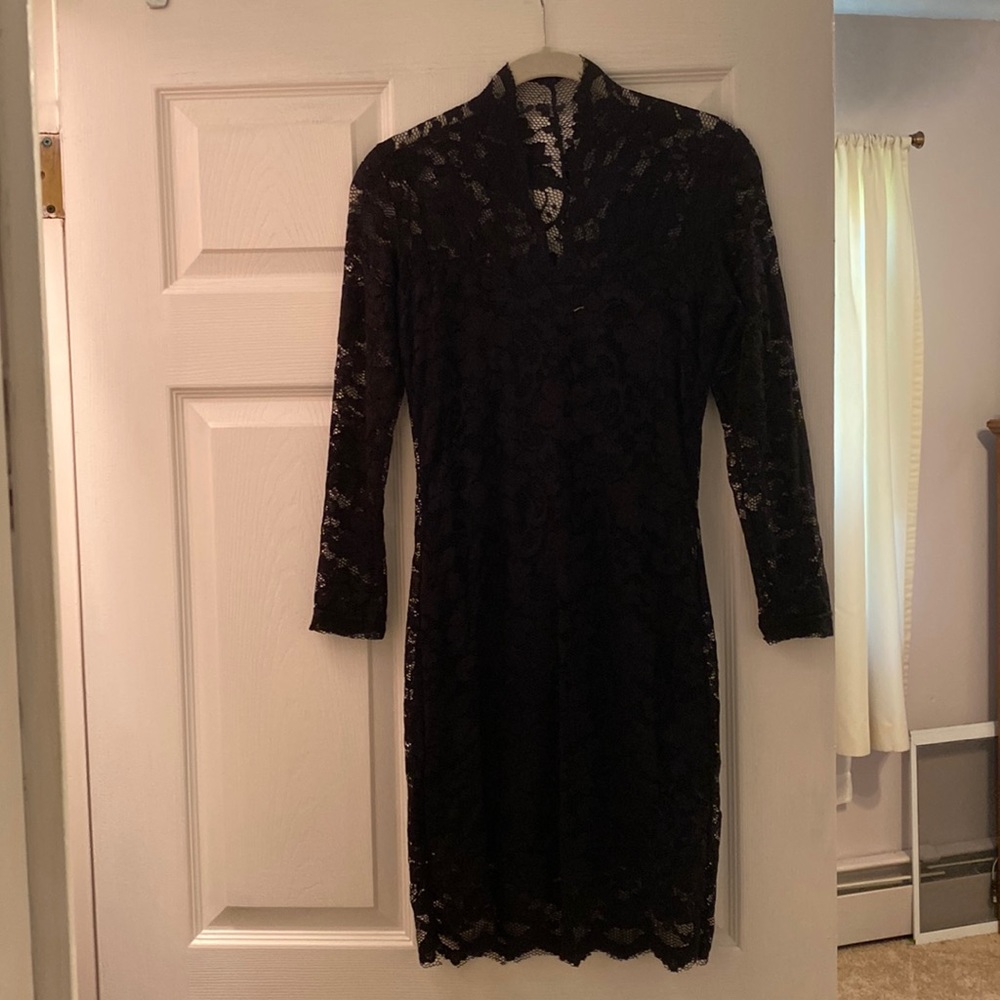 Black Lace dress. Stretchy material.Lined